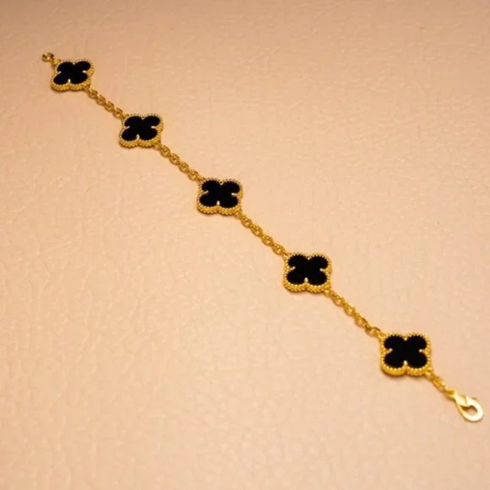 Van Cleef & Arpels Gold and Black Bracelets